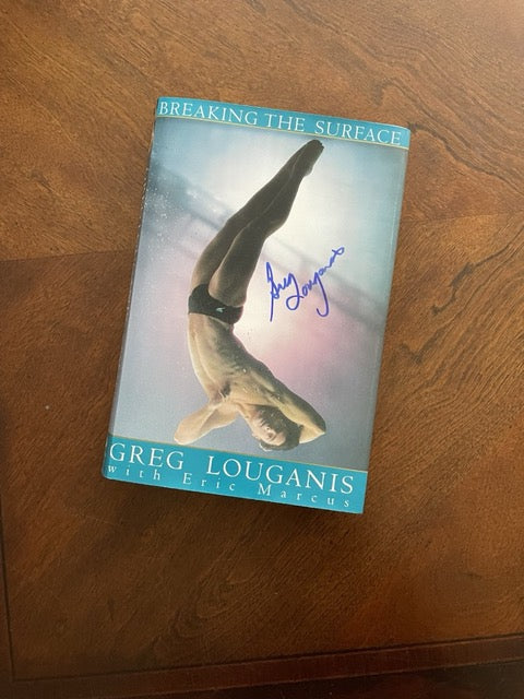 Autographed 1st Edition Breaking the Surface Book